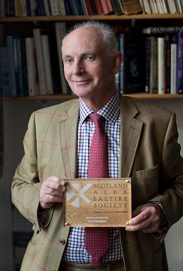 Hew Strachan with his commemorative plaque at Saltire Society HQ